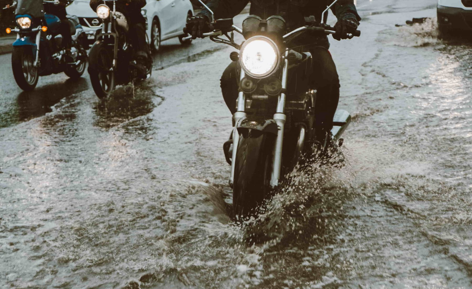 Flood motorcycle moving in flood