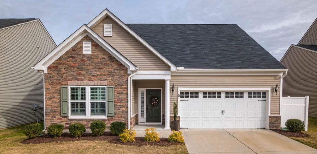 A house with a driveway and a lawn in Tulsa, OK