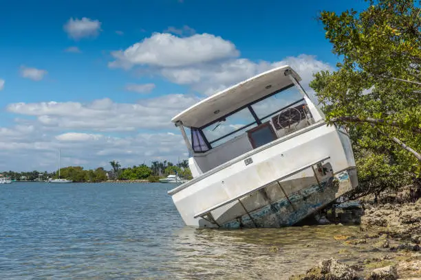 A boat that is sinking in water