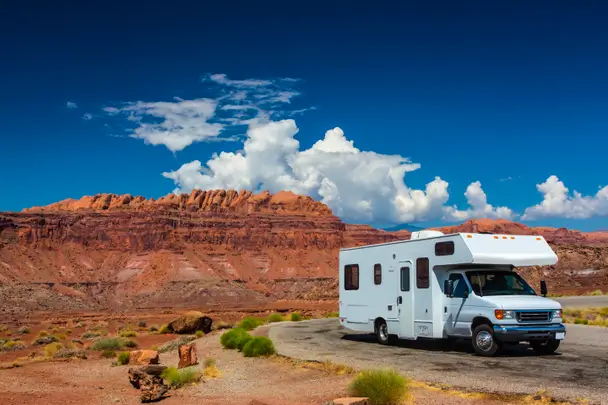 A RV parked in a desert