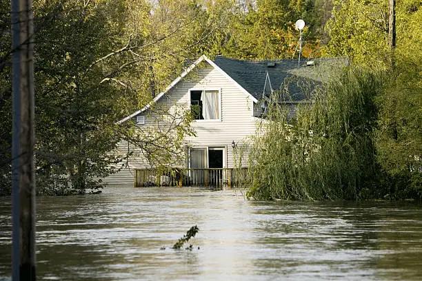 a house surrounded by water