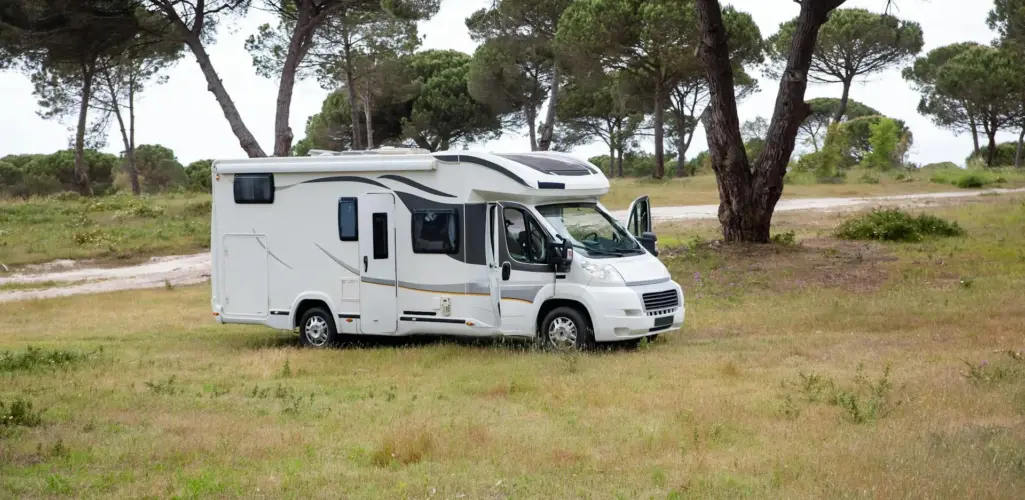 RV parked at a scenic campsite in Little Rock, AR