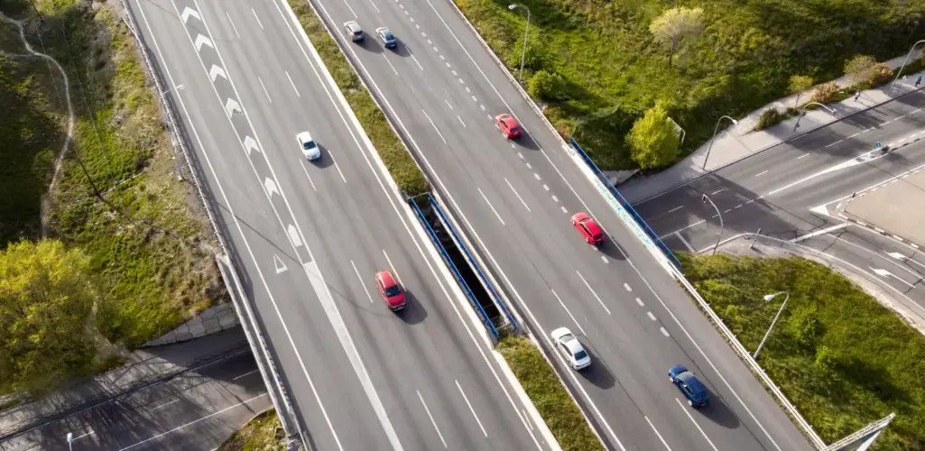 Aerial view of cars on a multi-lane highway.