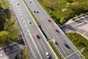 Aerial view of cars on a multi-lane highway.