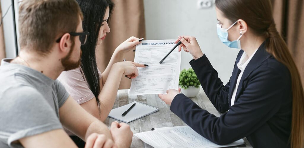 Couple reviewing their Arkansas home insurance checklist for 2026