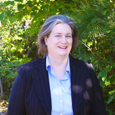 Tonya with background insurance agency Fayetteville, Arkansas