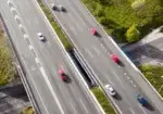 Aerial view of cars on a multi-lane highway.